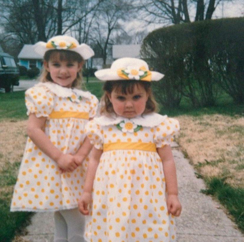 Alix and Erin, the sisters behind Ghost Misadventures, in matching polka-dot dresses